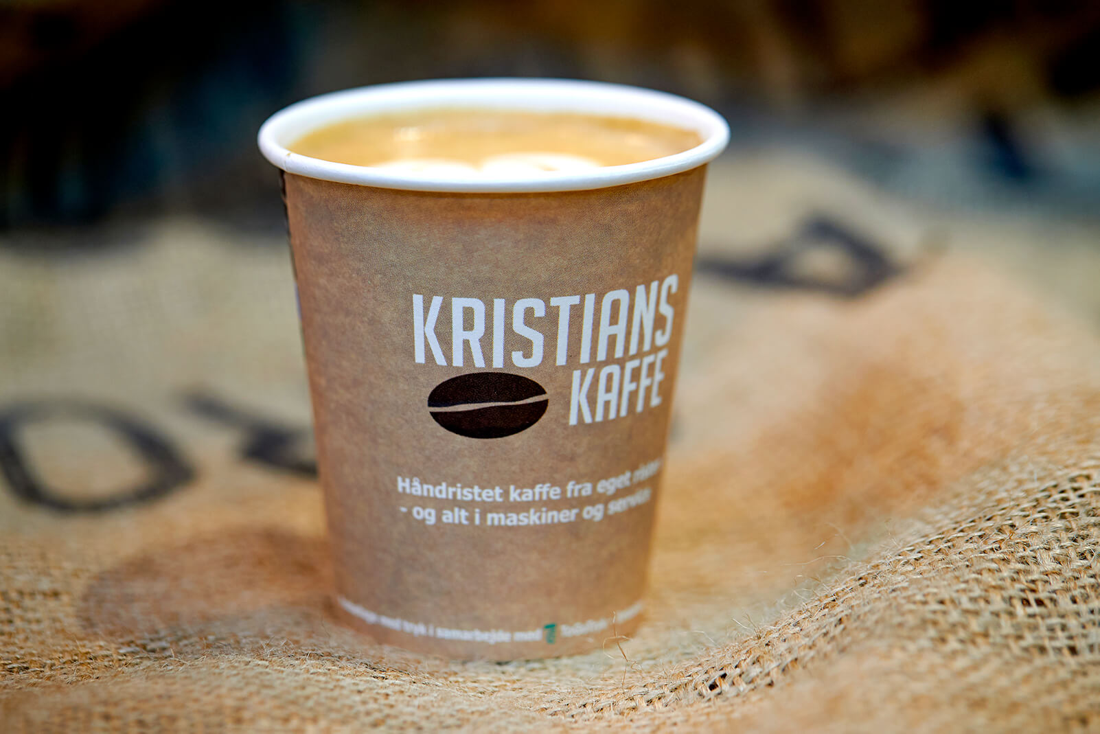 This image has an empty alt attribute; its file name is kristians-kaffe-paper-cup-logo.jpg